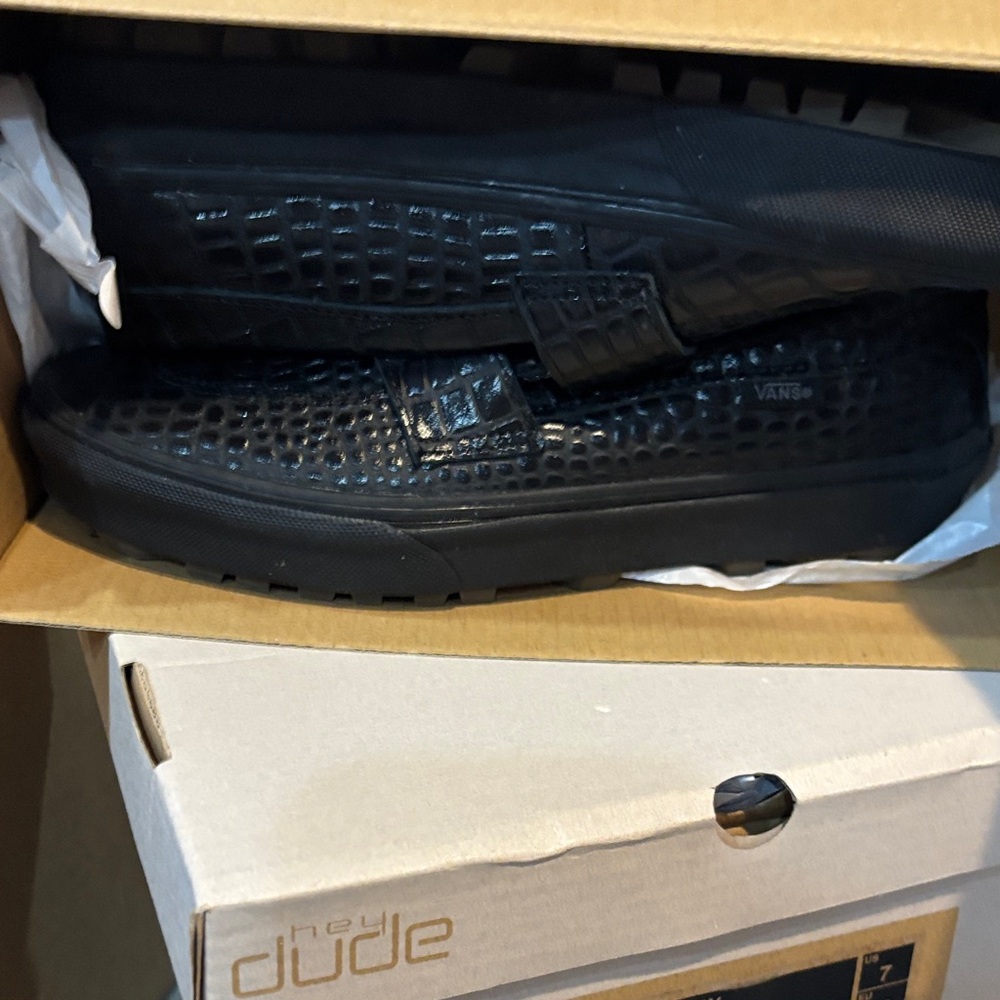 Vans Men's Black Textured Slip-Ons